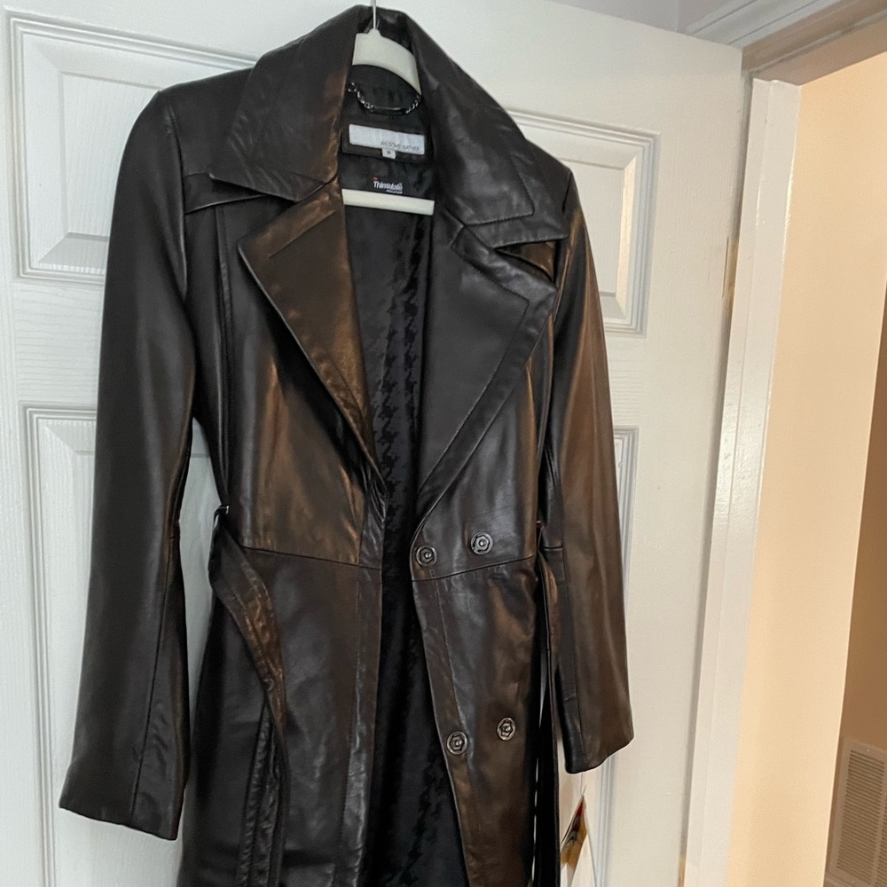 Wilson Thigh length leather thinsulate coat. Tags have been removed. Never worn